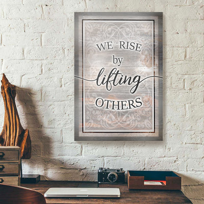 We Rise By Lifting Others Canvas Prints