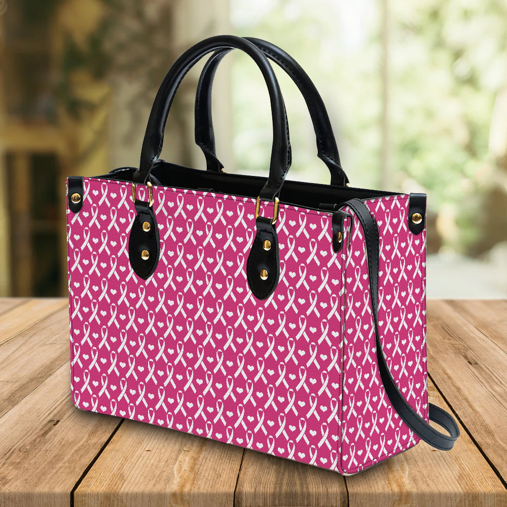 Hope For A Cure Handbag With Adjustable Shoulder Strap Featuring Pebbled  Faux Leather And A Charm